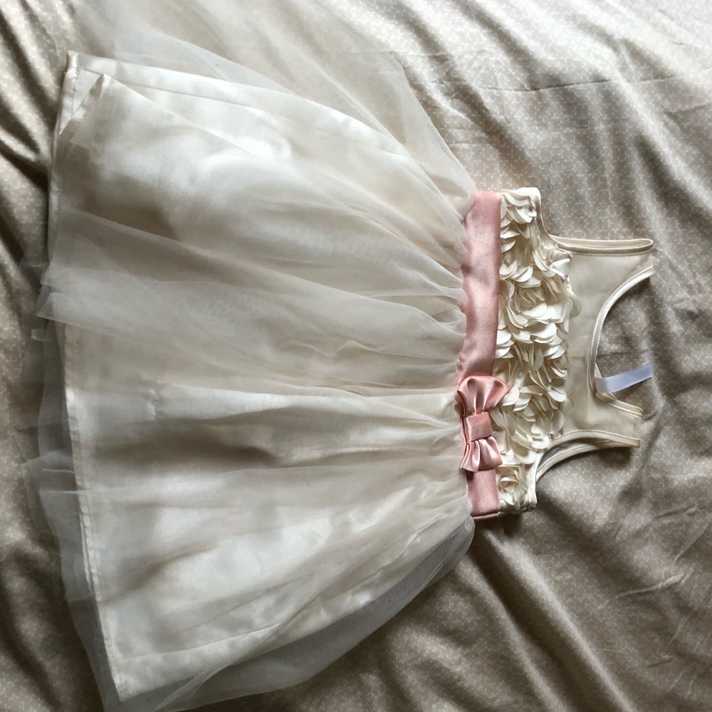 Off white dress with flowers and pink bow